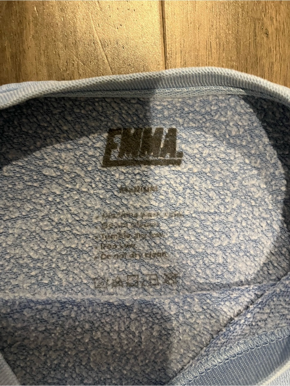 Soft Light Blue Crewneck Sweatshirt with Small Chest Graphic - Picture 9 of 9